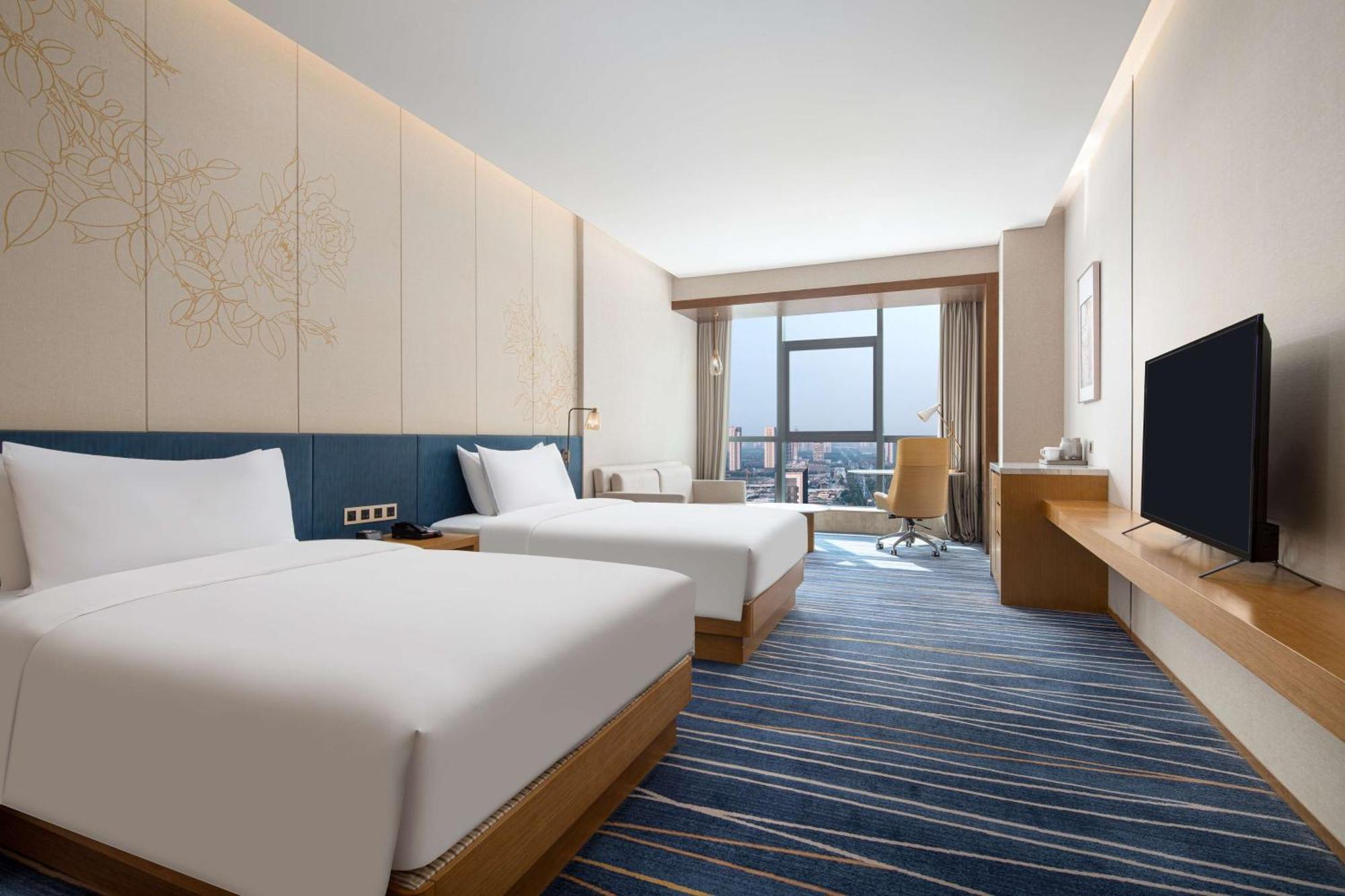 Hilton Garden Inn Zibo Zhangdian Bagian luar foto